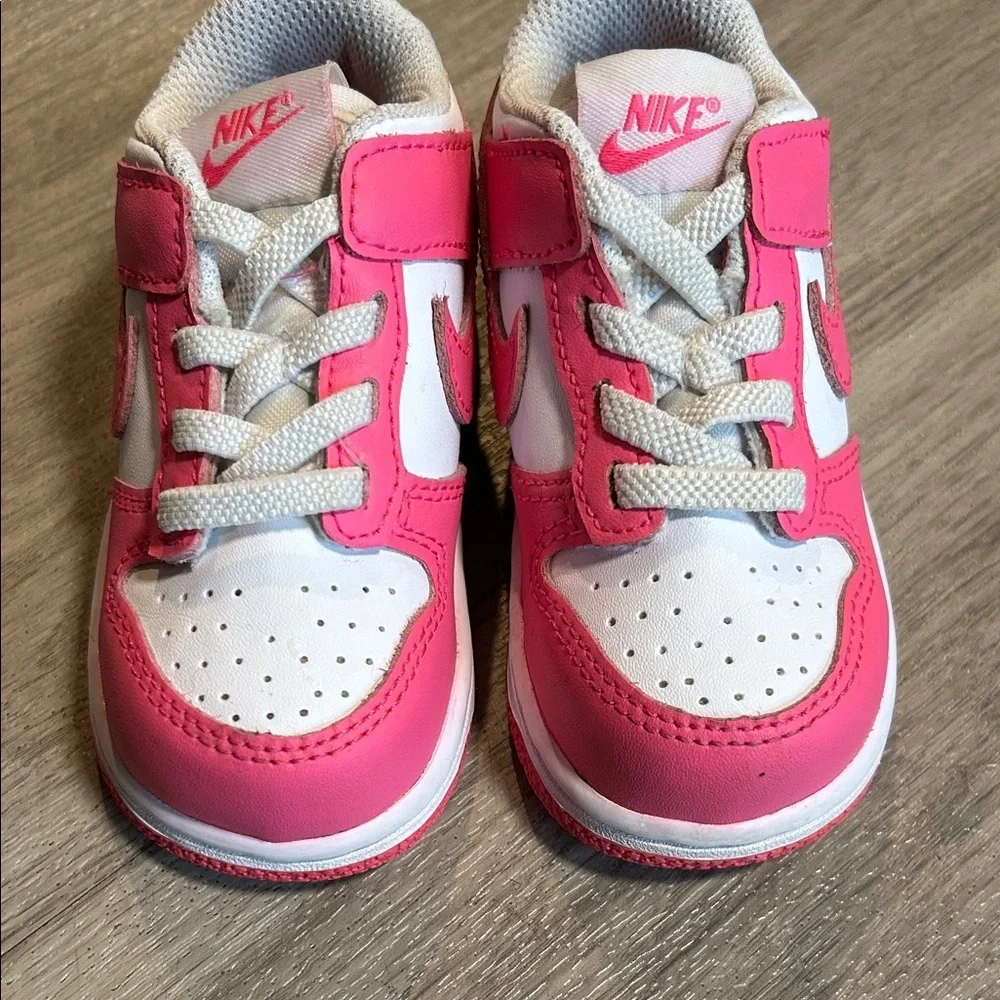 Nike Kids White and Hot Pink Low-Top Sneakers.